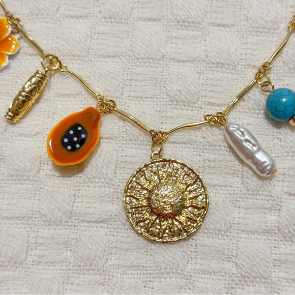 NEW Gold Tone Charm Necklace with Sun Medallion, Pearl & Turquoise Blue Accents - Picture 4 of 9